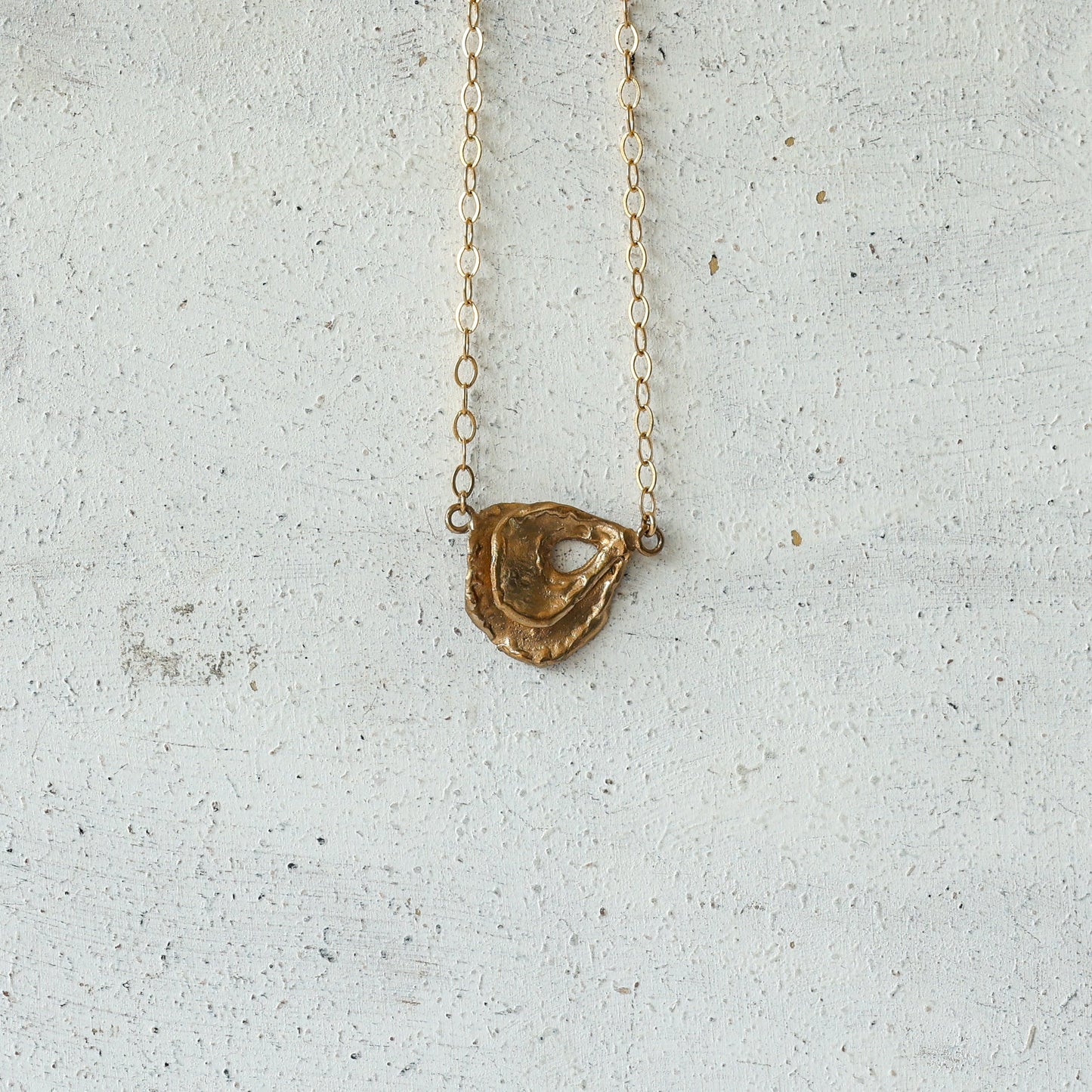 Oyster Pendant - Bronze